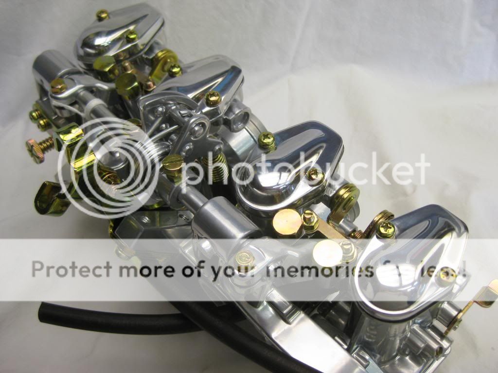 http://i888.photobucket.com/albums/ac88/kpruyne/May%2003%202014%20550%20Carbs%20Chrome%20Polished%20with%20Gold/IMG_0015.jpg
